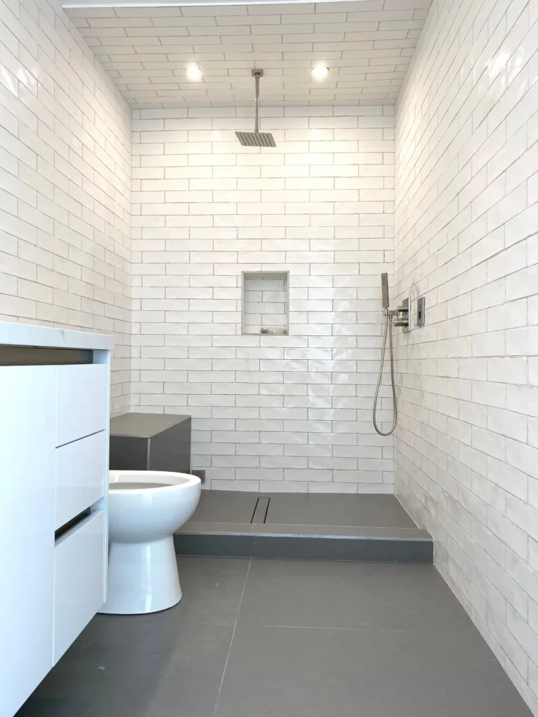 Modern bathroom remodeling project by WW Builders in San Jose, Silicon Valley, California featuring custom vanity and contemporary finishes