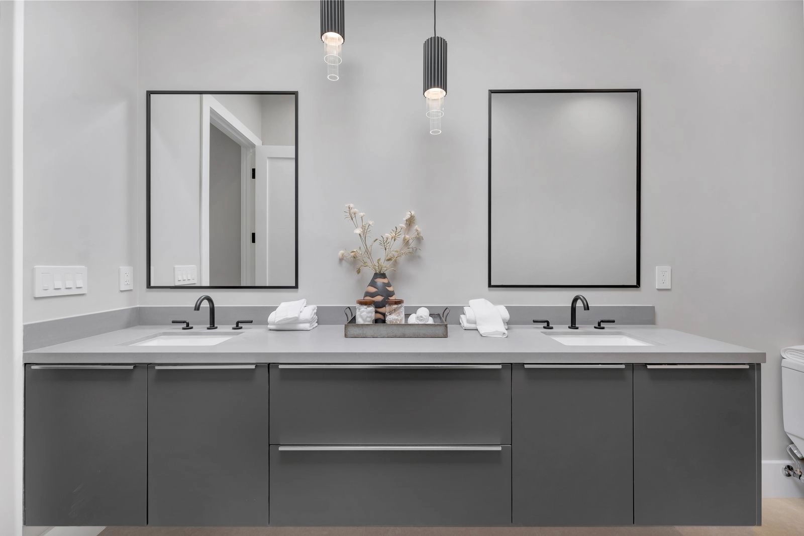 Custom bathroom vanity and mirror installation by WW Builders in Palo Alto, California