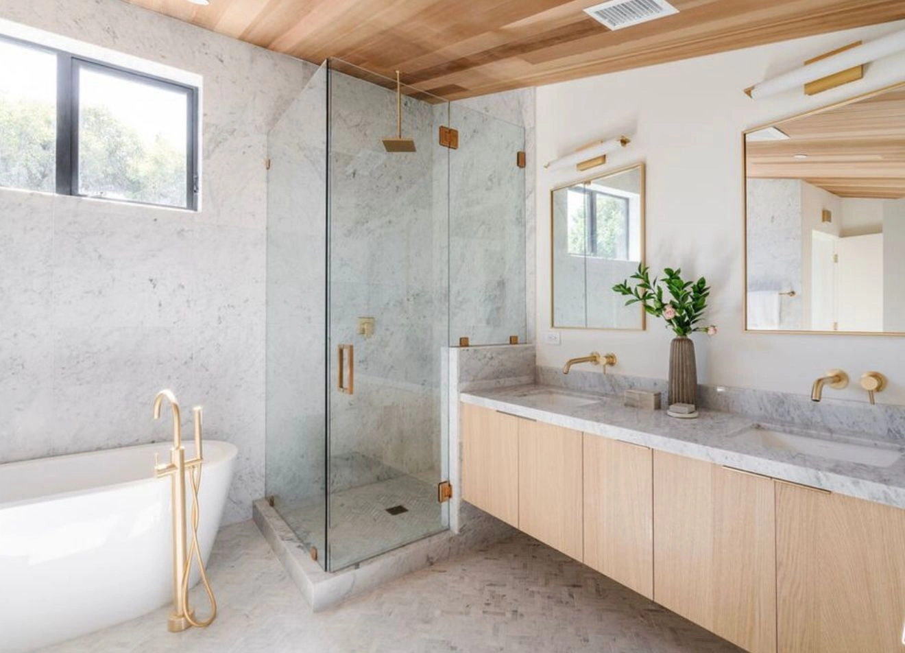 Luxury bathroom remodeling project completed by WW Builders in Los Altos, California featuring custom shower and vanity